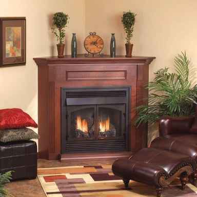 Empire Cabinet Mantels for Vail Premium Gas Fireplaces - Wooden fireplace with decorative items in a living room setting