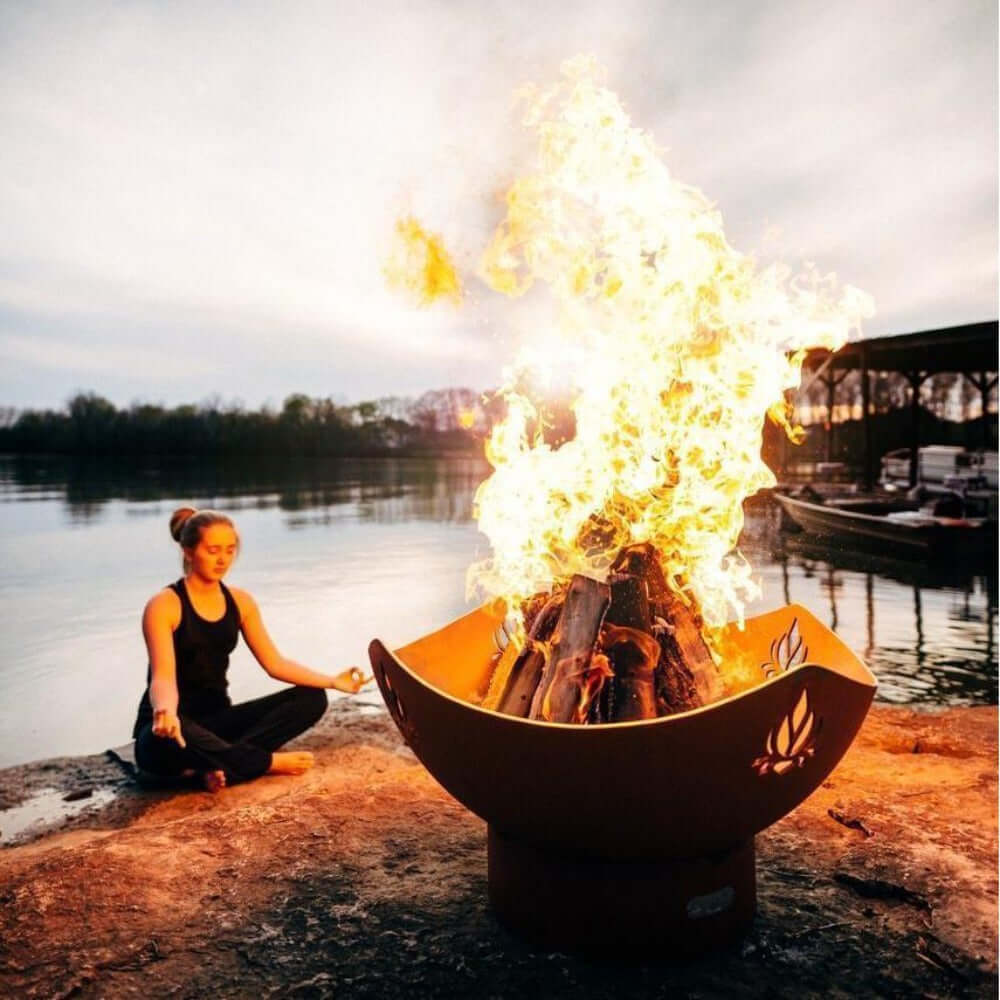 Fire Pit Art Namaste 36-Inch Handcrafted Carbon Steel Fire Pit (NAM) - woman meditating outdoors