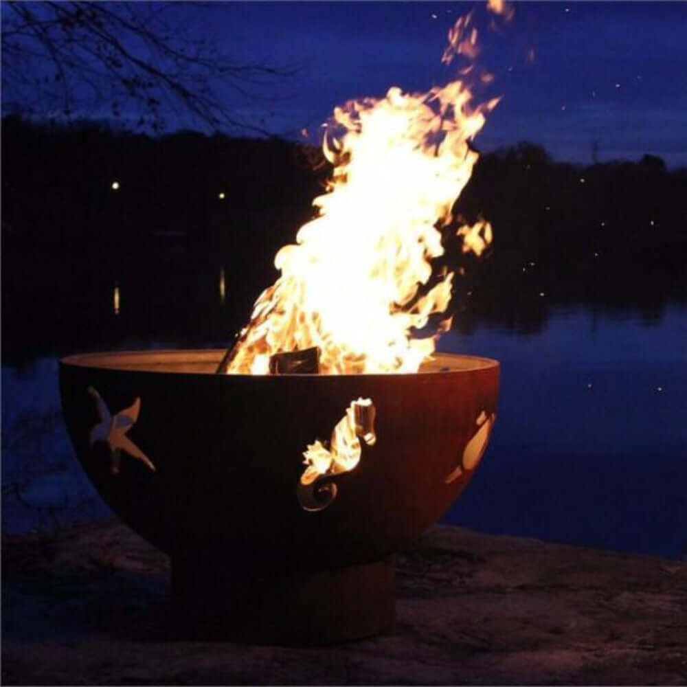 Fire Pit Art Sea Creatures 36-Inch Handcrafted Carbon Steel Fire Pit (SEA) - night time