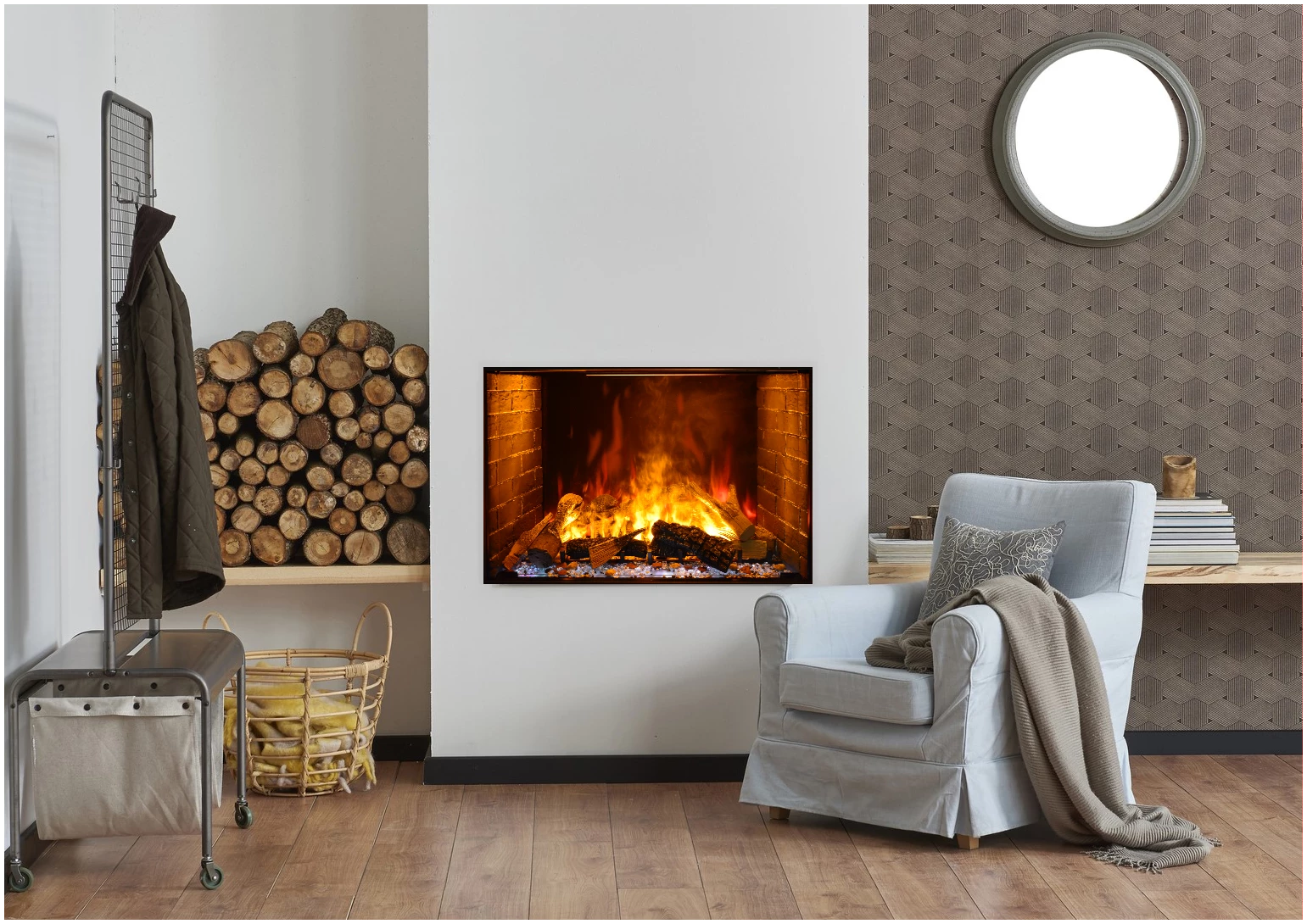 Amantii TRD Signature Series TRD-38-SIG - Living room with a fireplace, armchair, and stacked logs.