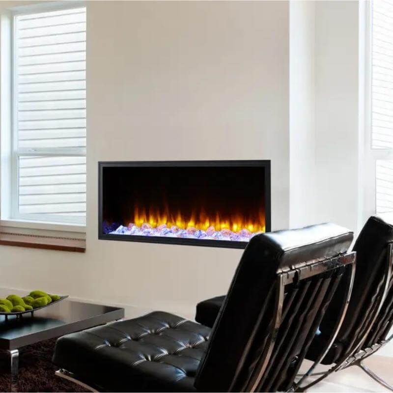 SimpliFire Scion Built-In Electric Fireplace - A contemporary fireplace paired with a black leather chair.