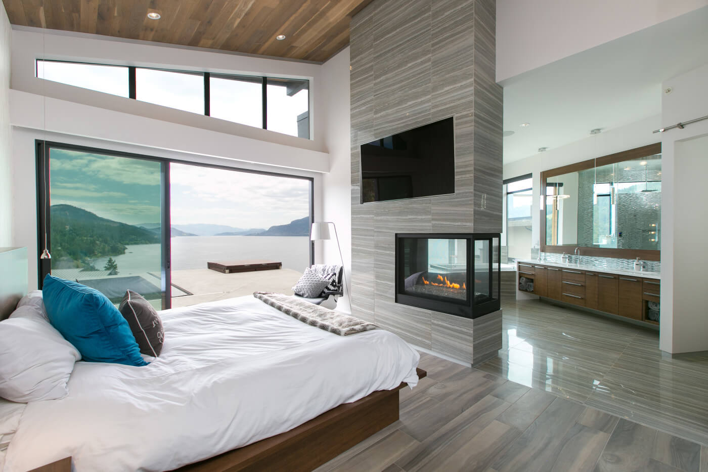 Napoleon Ascent™ Multi-View Series Direct Vent Fireplace - In a modern minimalist bedroom