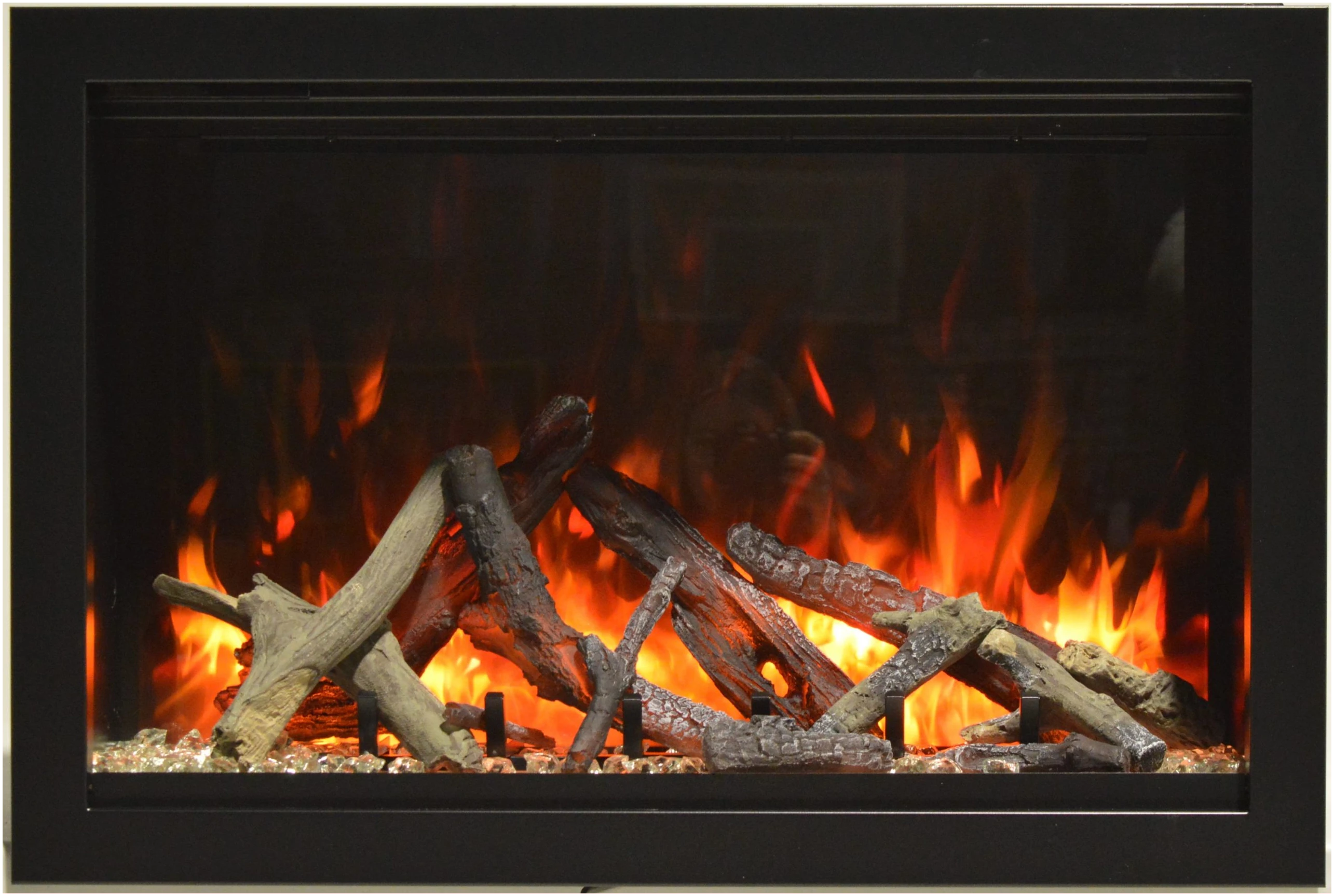 Amantii TRD Lumina Electric Fireplace - Fireplace with glowing logs and flames inside a black frame