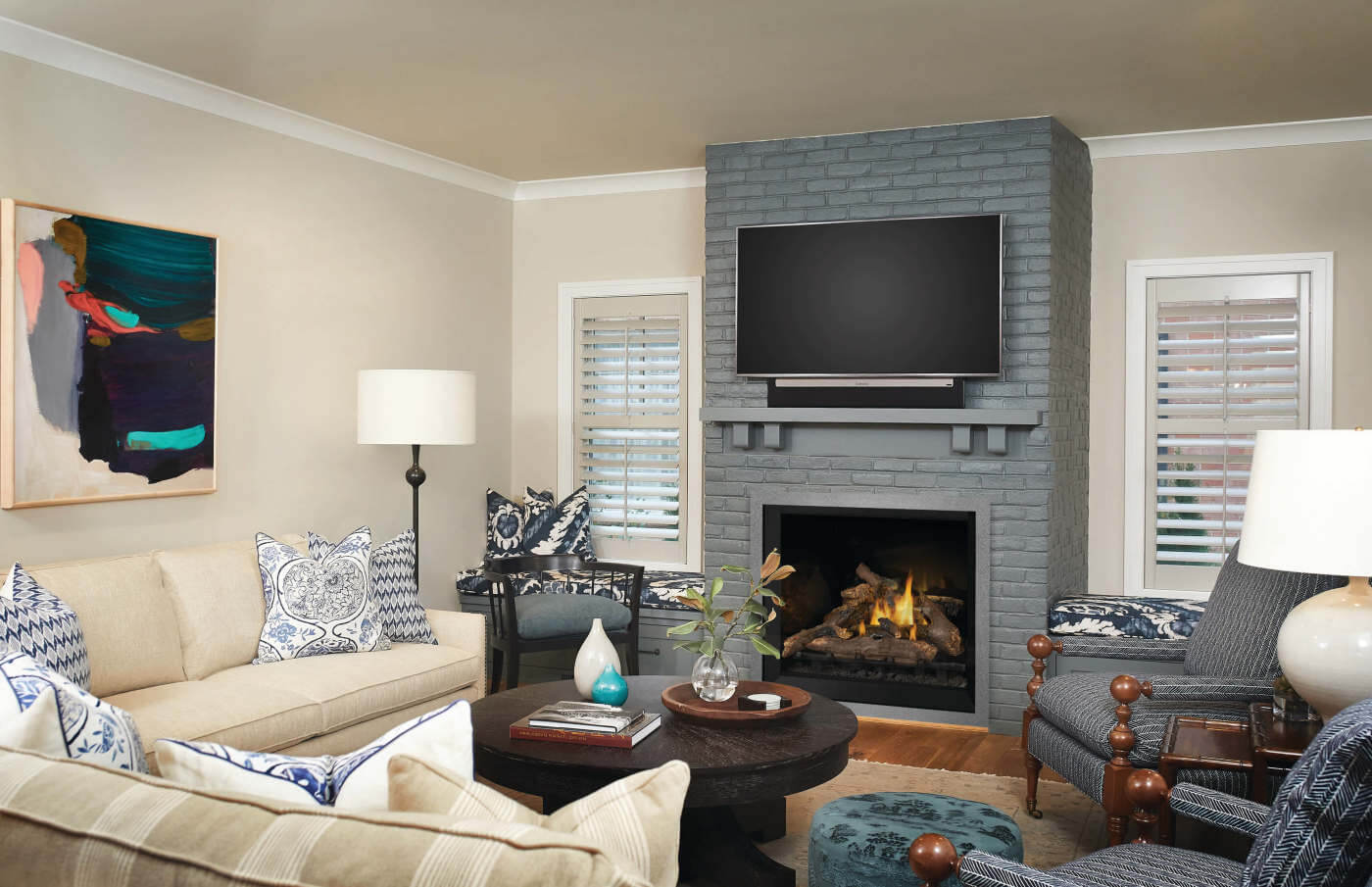 Napoleon Elevation™ Series Direct Vent Gas Fireplace - Living room with a fireplace, television, and decorative pillows.