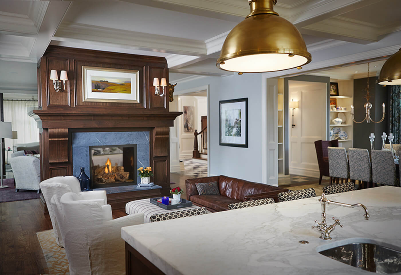 Napoleon High Definition 81 Direct Vent Gas Fireplace - Modern living room with fireplace, sofa, and kitchen island.