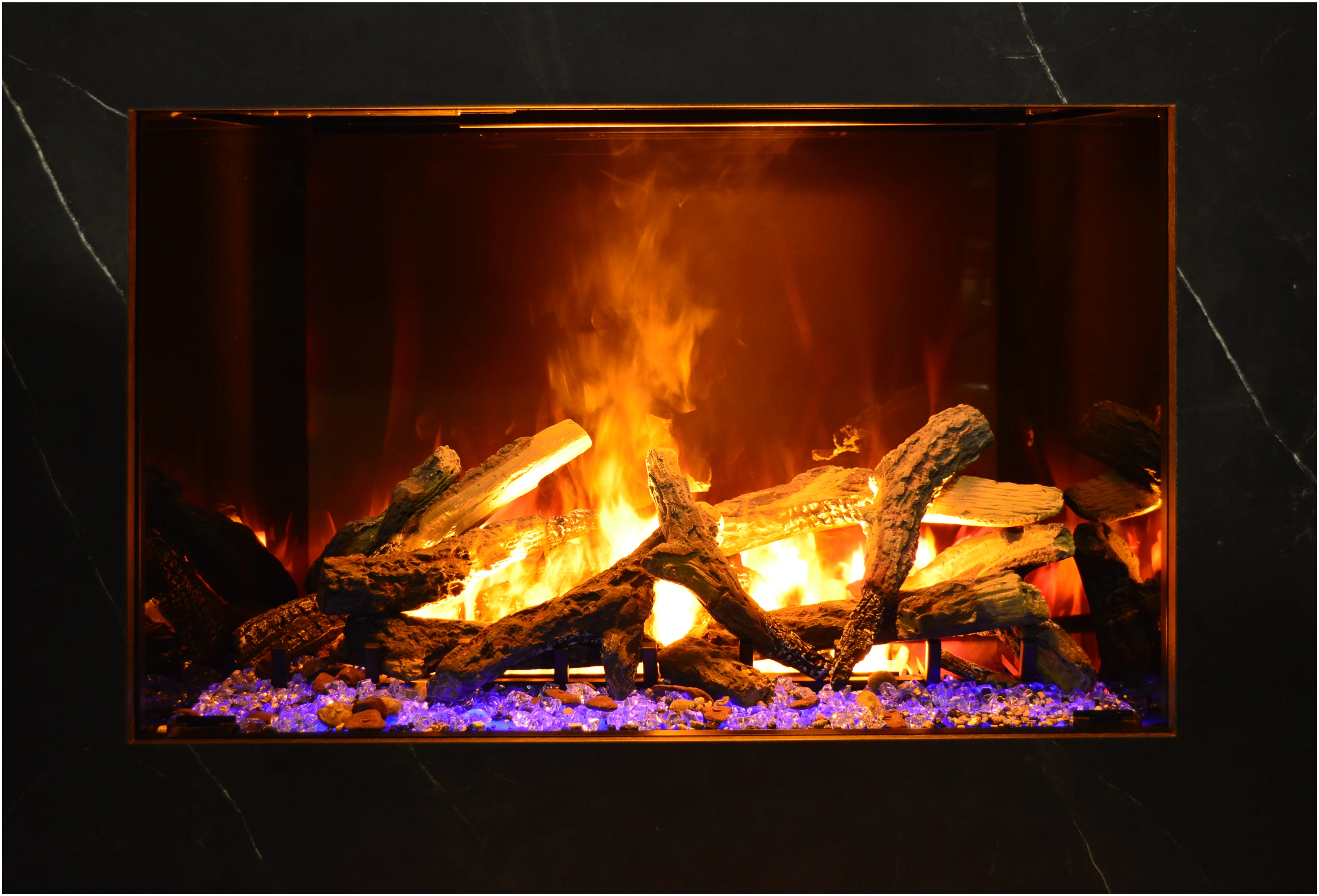Amantii TRD Signature Series TRD-38-SIG - Fireplace with burning logs and flames on a dark background