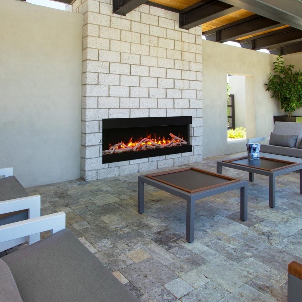 Amantii True View Slimline Smart Electric Fireplace - A charming patio with a crackling fireplace and comfortable seating