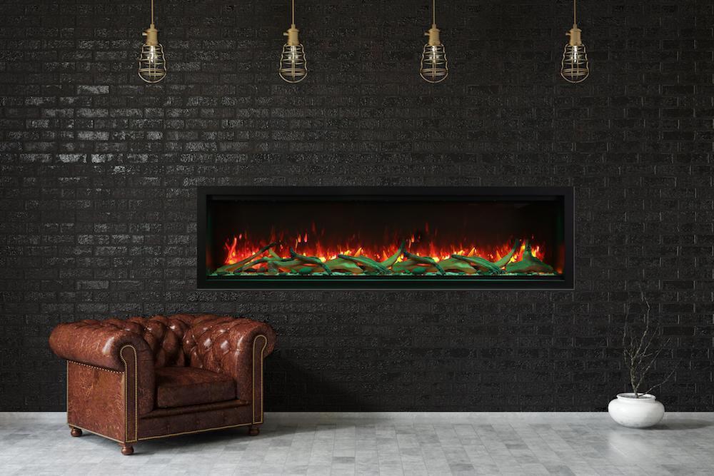 Amantii Symmetry XT Premium Electric Fireplace with Smart Control - A contemporary fireplace paired with a plush leather chair