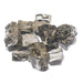 Athena 1/2" reflective fire glass in a pile, ideal for enhancing fireplaces and fire pits with vibrant colors.