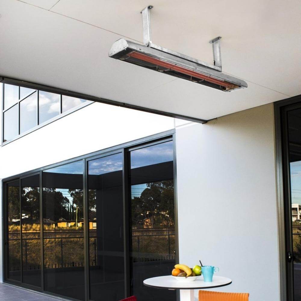 Bromic Cobalt Smart-Heat electric heater mounted on patio ceiling, providing warmth to outdoor space.