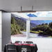 Bromic Cobalt Smart-Heat wall-mounted electric heater in outdoor dining area with scenic mountain views.
