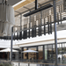Interior view of modern commercial space featuring Bromic Platinum electric heater for optimal warmth.