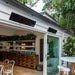 Bromic Platinum 208V electric heaters mounted on a modern restaurant ceiling.