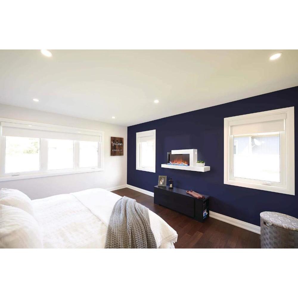 Contemporary bedroom featuring Napoleon Stylus 59-inch wall mounted electric fireplace with USB charging port.