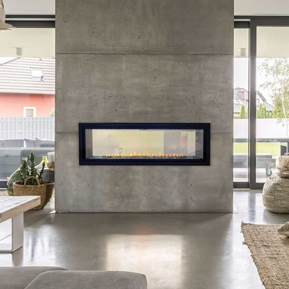 Empire Boulevard 48-Inch Linear Vent-Free See-Through Gas Fireplace - Modern living room with a concrete wall and linear fireplace.