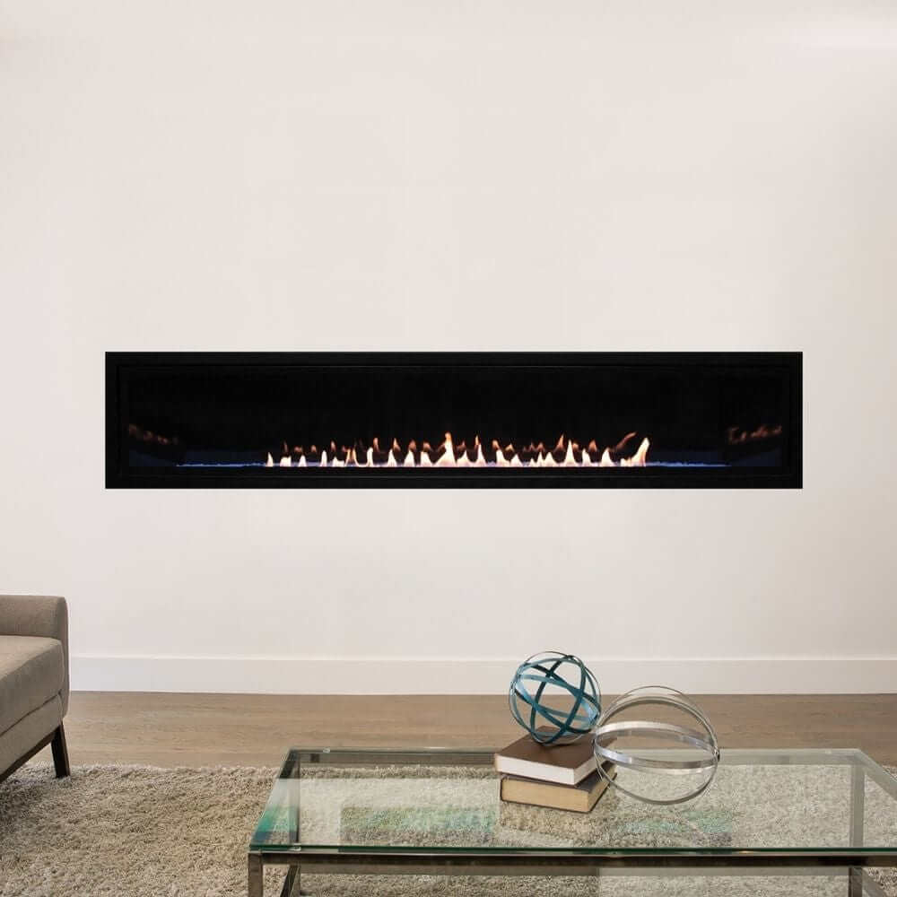 Empire Boulevard 72-Inch Linear Vent-Free Gas Fireplace - Modern electric fireplace mounted on a white wall with a glass coffee table in front.