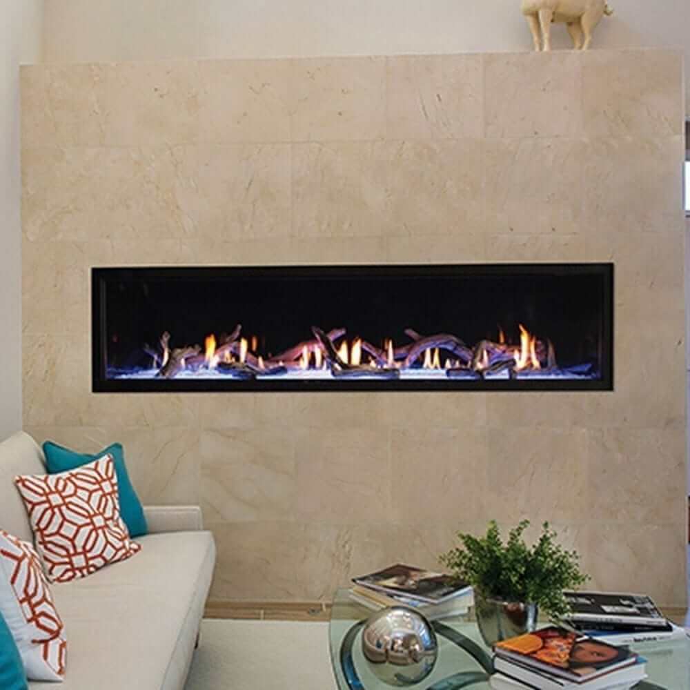 Empire Boulevard 72-Inch Linear Vent-Free Gas Fireplace - Modern living room with a linear gas fireplace, beige walls, and decorative elements.