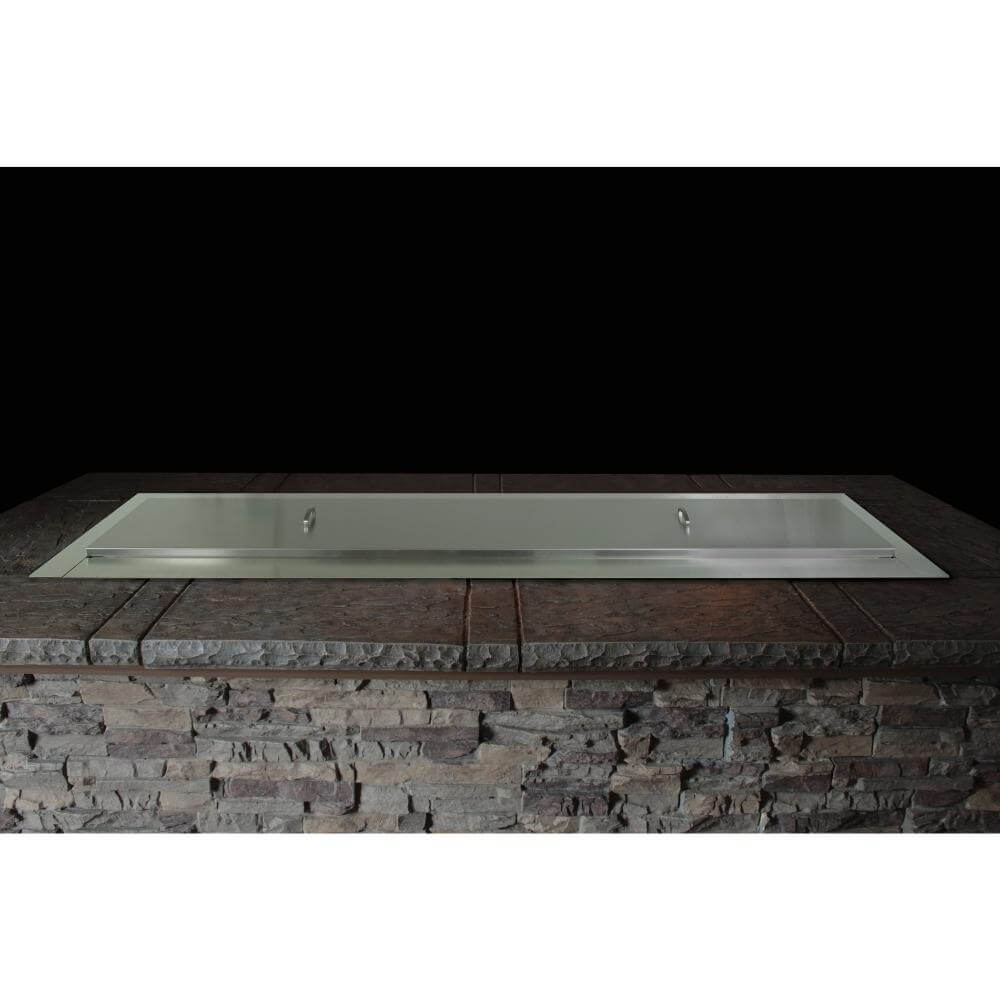 Empire Carol Rose Outdoor Stainless Steel Linear Gas Burner - Rectangular metal sink on a stone countertop with a black background