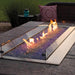 Empire Carol Rose Outdoor Stainless Steel Linear Gas Burner - Outdoor fire pit table with flames on a patio