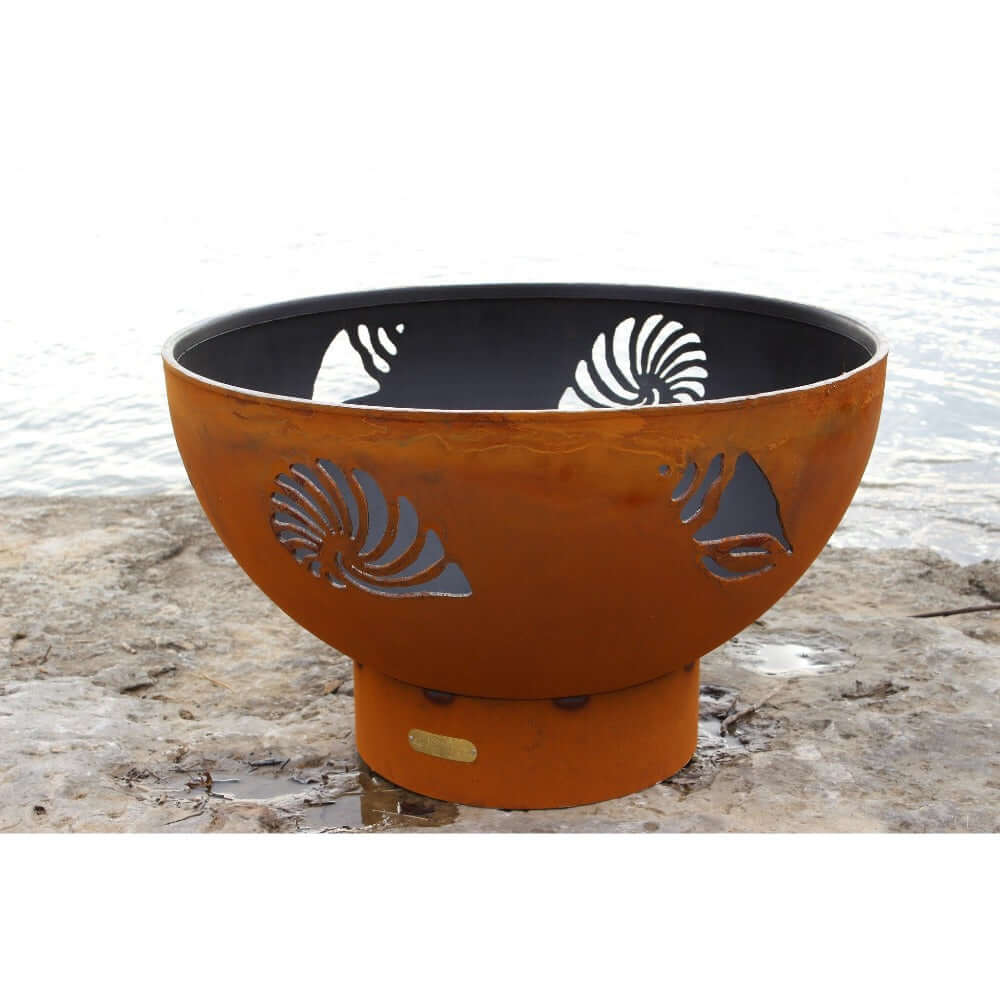 Fire Pit Art Beachcomber 36-Inch Handcrafted Carbon Steel Fire Pit (BEACH) - next to a beach