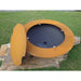 Fire Pit Art Saturn 40-Inch Handcrafted Carbon Steel Fire Pit (SAT) - Round metal object with a yellow cover on a grassy background