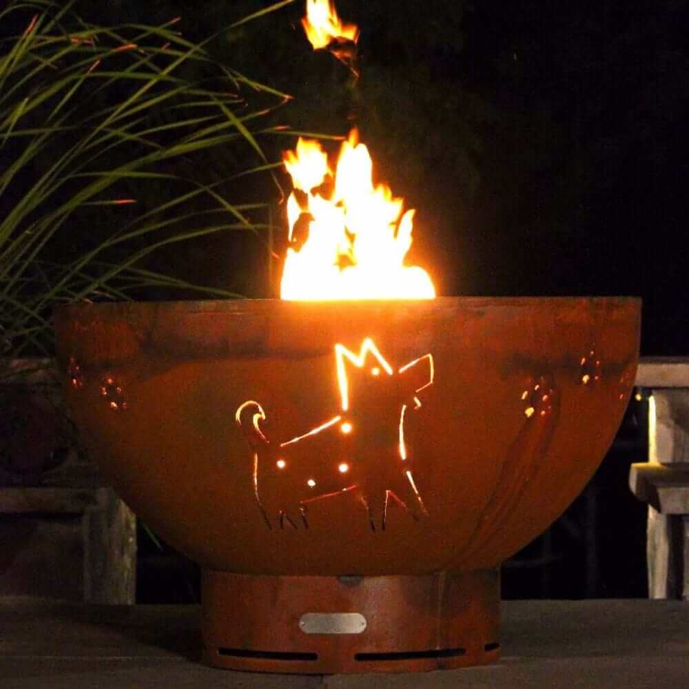 Fire Pit Art Funky Dog 36-Inch Handcrafted Carbon Steel Fire Pit (FDOG) - Fire pit with a cat design on fire at night