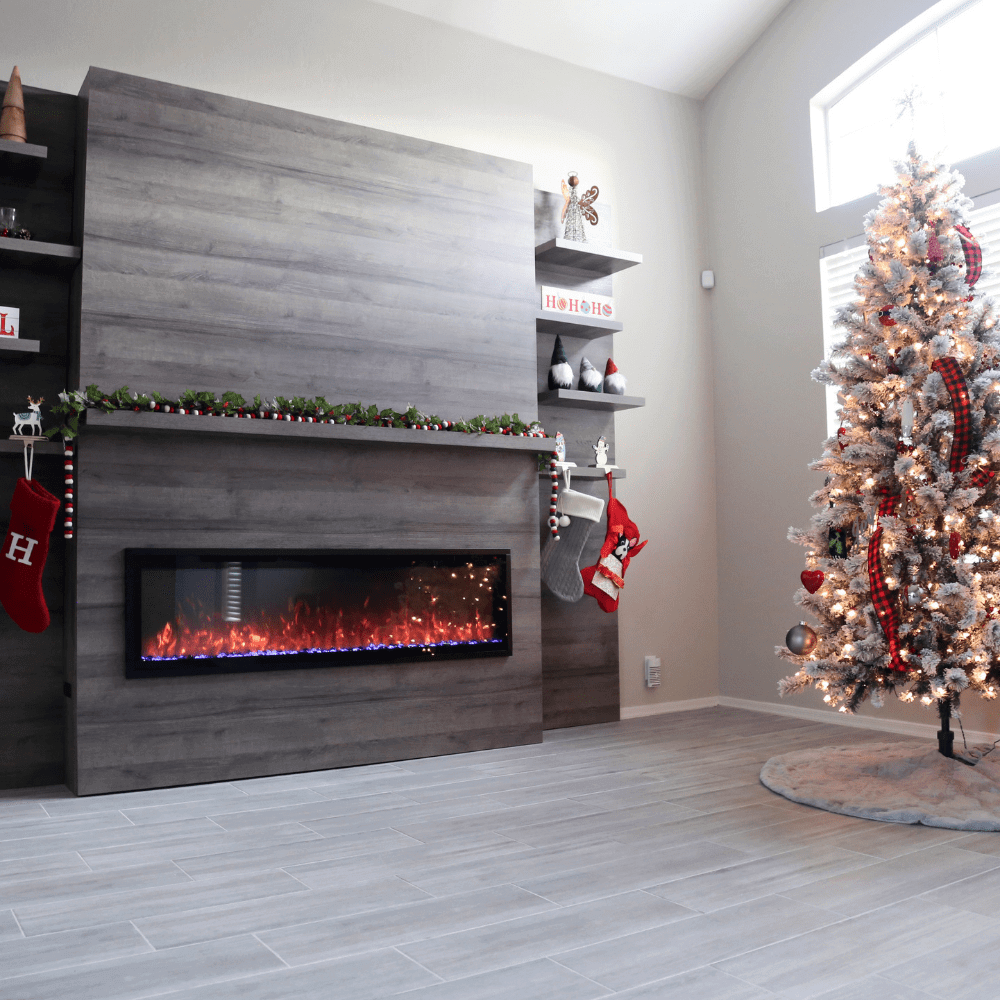 Allwood Fireplace Wall System for Spectrum Slimline Electric Fireplace - A cozy holiday living room features a modern electric fireplace, decorated tree, and stockings on a wooden mantel.
