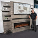 Allwood Fireplace Wall System for Spectrum Slimline Electric Fireplace - A modern fireplace wall system featuring a sleek design, a digital display, and decorative shelves with various objects.
