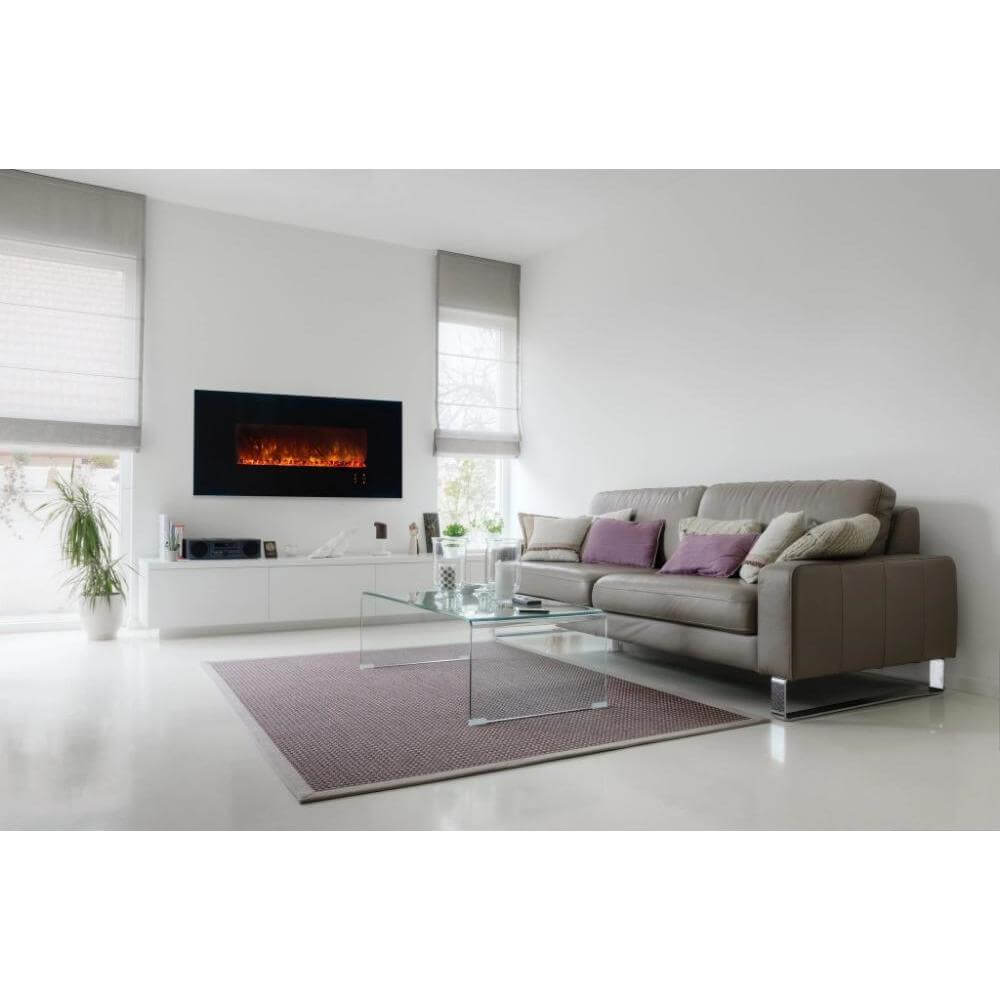 CLX 2 60" Built-in/Wall Mounted Electric Fireplace - Modern living room with a gray sofa, glass coffee table, and wall-mounted electric fireplace, featuring a minimalist aesthetic.