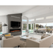 Spectrum Slimline Built-in/Wall Mounted Electric Fireplace - Modern living room with light colors, a sleek fireplace, and large windows opening to a poolside view, featuring stylish furniture.