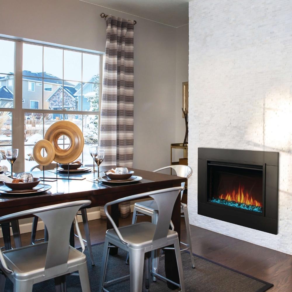 Stylish dining room with Napoleon Cineview electric firebox adding elegance and warmth to the space.