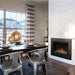 Stylish dining room with Napoleon Cineview electric firebox adding elegance and warmth to the space.