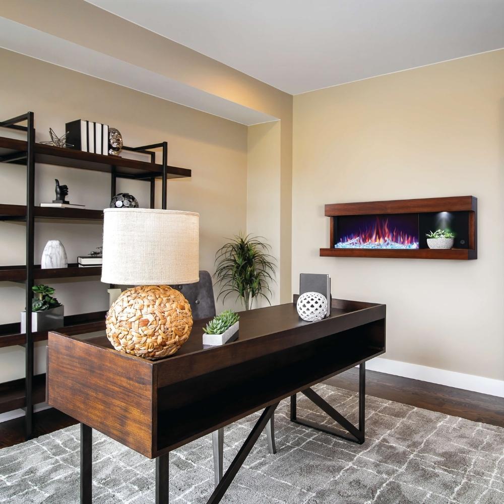 Modern office with Napoleon Stylus wall-mounted electric fireplace and stylish desk decor.