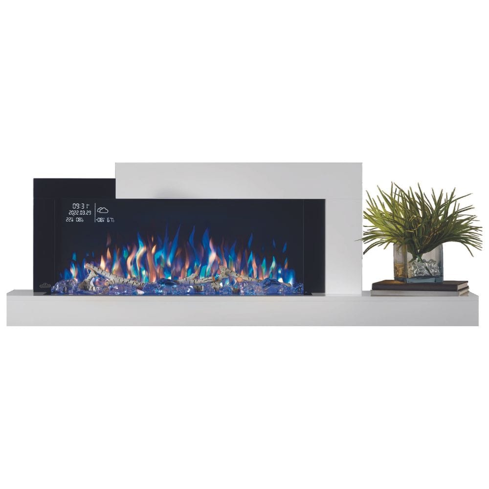 Wall-mounted Napoleon Stylus Cara Elite electric fireplace with colorful flames, shelf decor, and a charging dock.