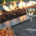 Empire Carol Rose Outdoor Stainless Steel Linear Gas Burner - Glass of white wine and cheese cubes by a fire pit