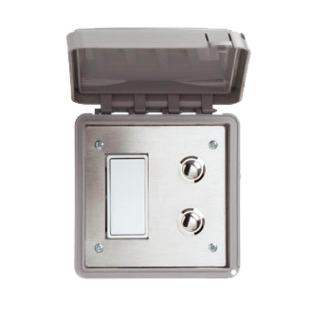 Outdoor natural gas fireplace control box with cover and igniter switches.