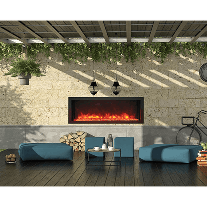 Remii Extra Slim Indoor/Outdoor Frameless Smart Built-in Electric Fireplace - Charming outdoor fireplace with bright blue seating and greenery