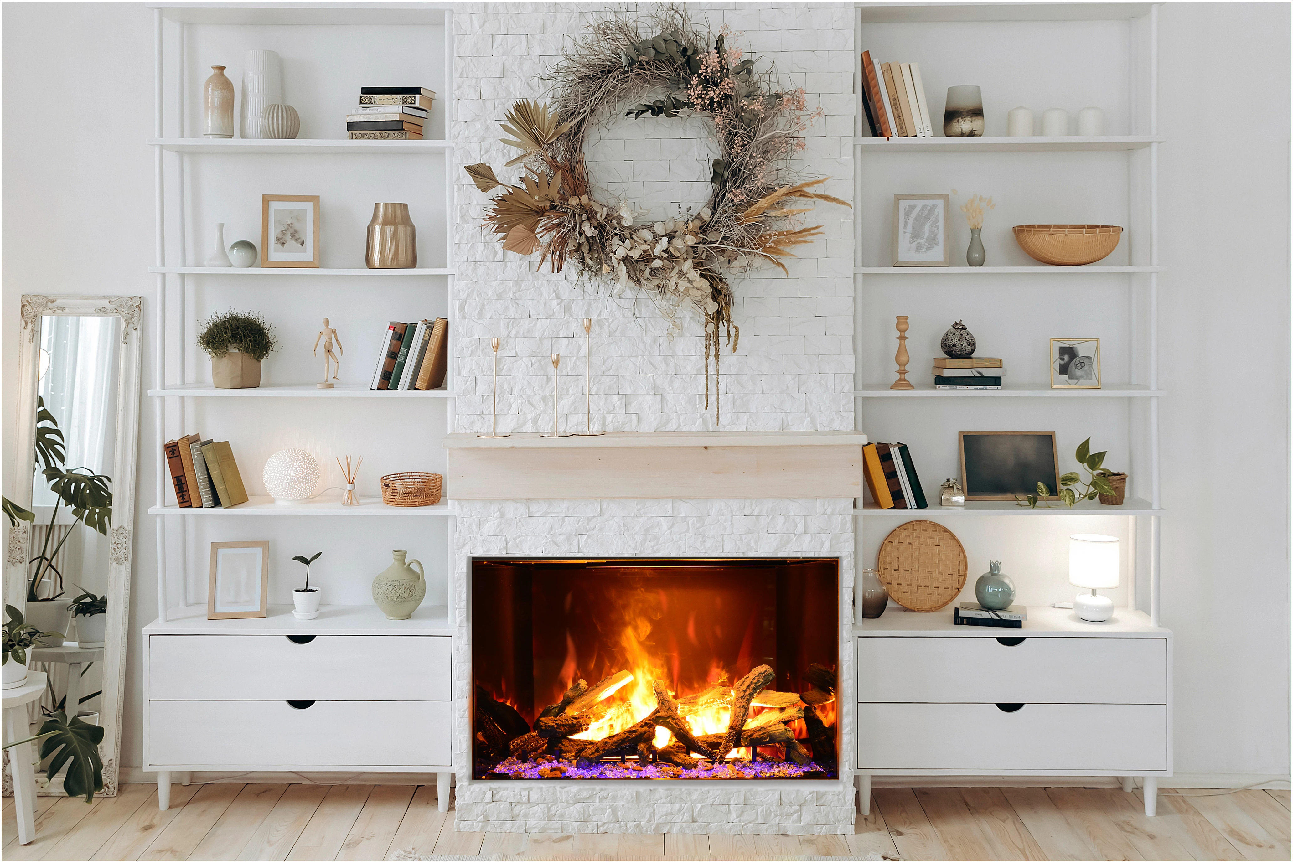 Amantii TRD Signature Series TRD-38-SIG - Living room with a fireplace, shelves, and decorative items.