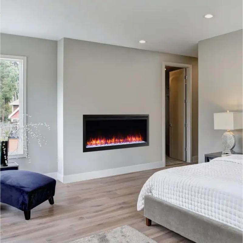 SimpliFire Allusion Platinum Recessed Electric Fireplace - A serene bedroom showcasing a charming fireplace beside a comfortable bed.