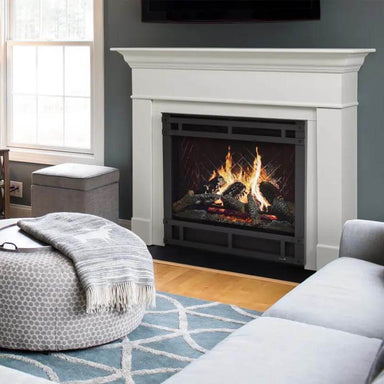 SimpliFire Inception Built-In Electric Fireplace - A cozy living room featuring a fireplace, a couch, and a television.
