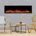 SimpliFire Forum Outdoor Electric Fireplace - A modern electric fireplace elegantly positioned against a rustic brick wall paired with wooden chairs.