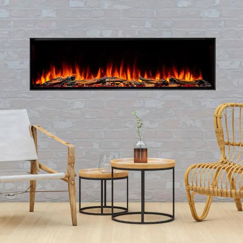 SimpliFire Forum Outdoor Electric Fireplace - A modern electric fireplace elegantly positioned against a rustic brick wall paired with wooden chairs.