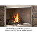VRE4300 gas fireplace featuring a white stacked liner, bi-fold glass door, and stainless steel hood for stylish outdoor warmth.