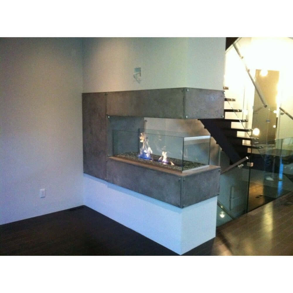 The Bio Flame 24-Inch Indoor/Outdoor Ethanol Fireplace Burner - A warm fireplace illuminates a room with graceful stairs
