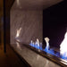The Bio Flame 38-Inch Ethanol Fireplace Burner, Indoor/Outdoor - A modern living space showcasing a fireplace with mesmerizing blue flames